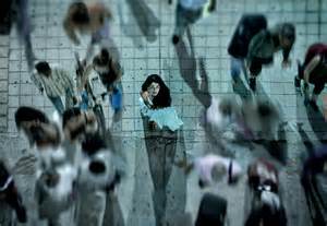 Girl Standing Alone In A Crowd...  courtesy of imgarcade.com