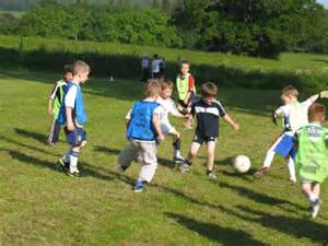 Kids playing football